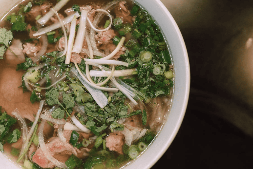 This pho with its clear, sweet broth, fragrant with ginger and scallions, is a dish that visitors cannot miss (Source: Pexels)
